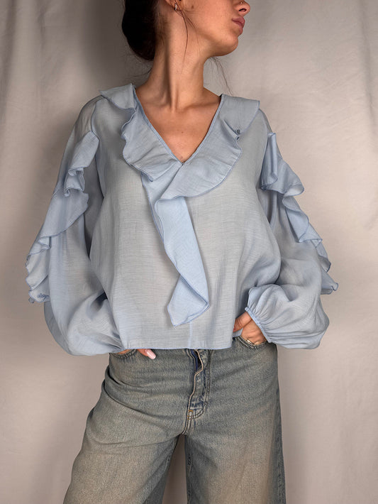 Blusa con Volant Tensione In Azzurro