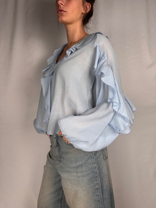 Blusa con Volant Tensione In Azzurro